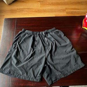 Black Nike running shorts